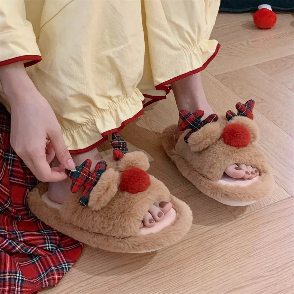 Brown women's cotton suede slippers with a cartoon deer print and PVC sole.