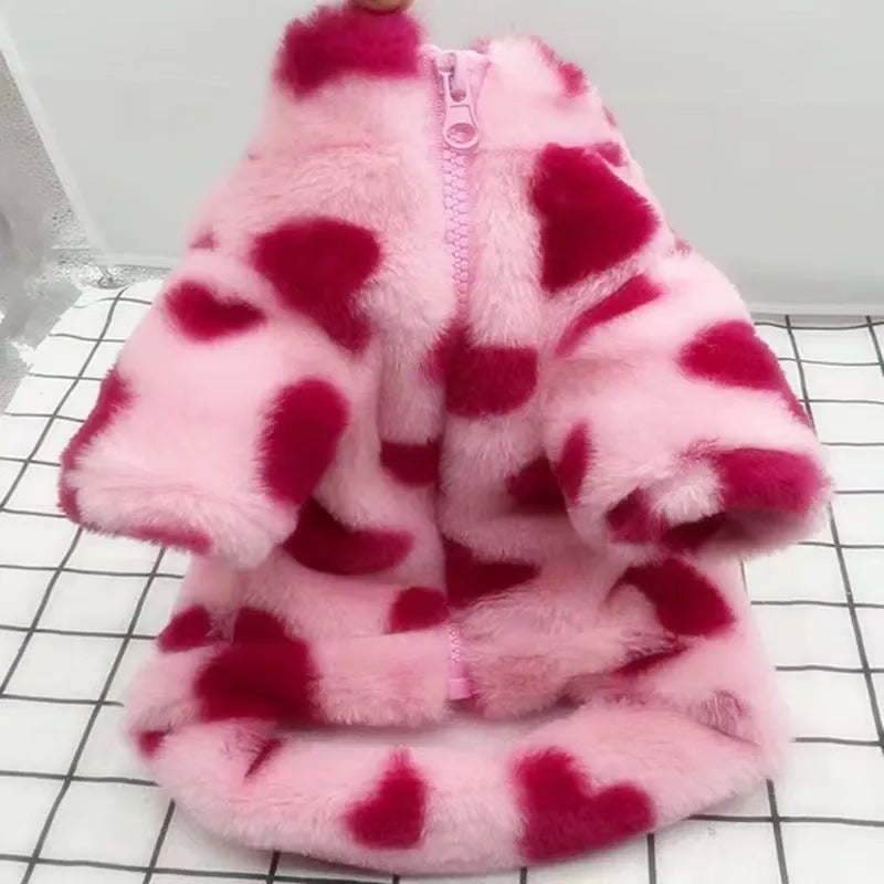 A pink plush polyester warm coat for a small dog, shown on a mannequin, British-style design.