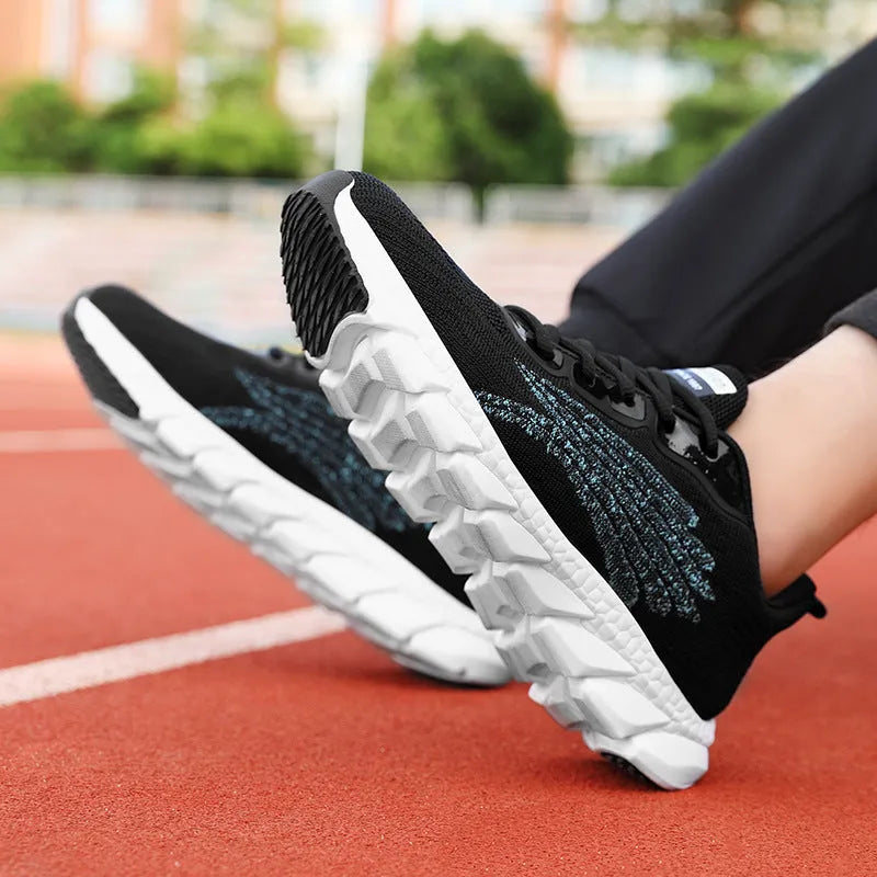 Flat running sneakers with cross-strap detail in black or white colours