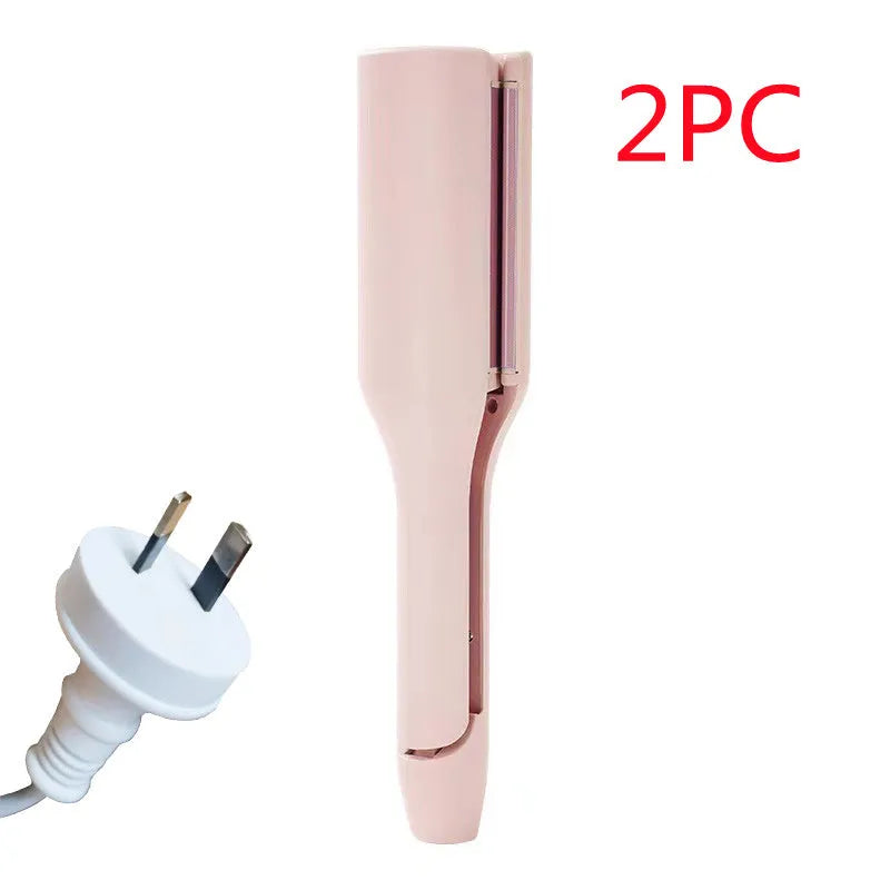 32mm pink hair curling iron with ceramic barrel and 4 heat settings on white background