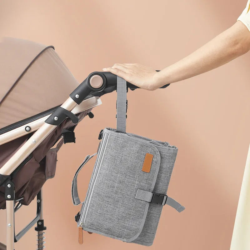 Waterproof grey polyester changing table pad for urinal and incontinence care, one size