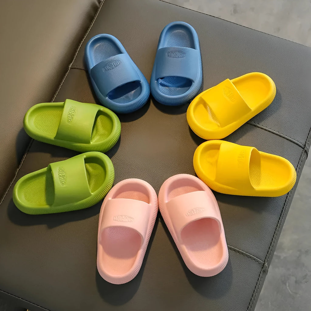 Children's mixed colour EVA slippers with a non-slip sole, shown in sizes for kids.