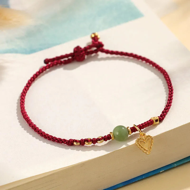 Handmade woven women's bracelet in 925 silver Hetian jade with red carrying strap