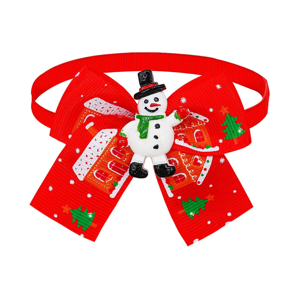 Red and green Christmas pet bow tie accessory for dogs or cats with British style design