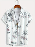 Man wearing a loose-fit floral print short sleeve shirt in a cardigan style.