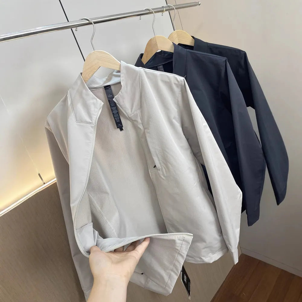 Men's stand collar casual jacket in polyester, shown in black, dark blue, and beige.