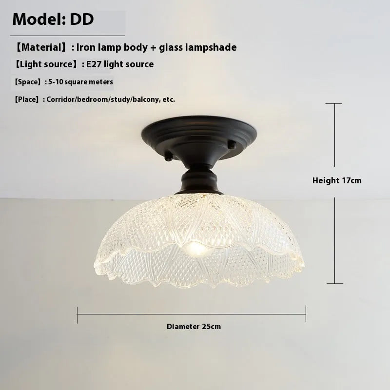 American retro single-head ceiling lamp with clear glass shade showing exposed filament style