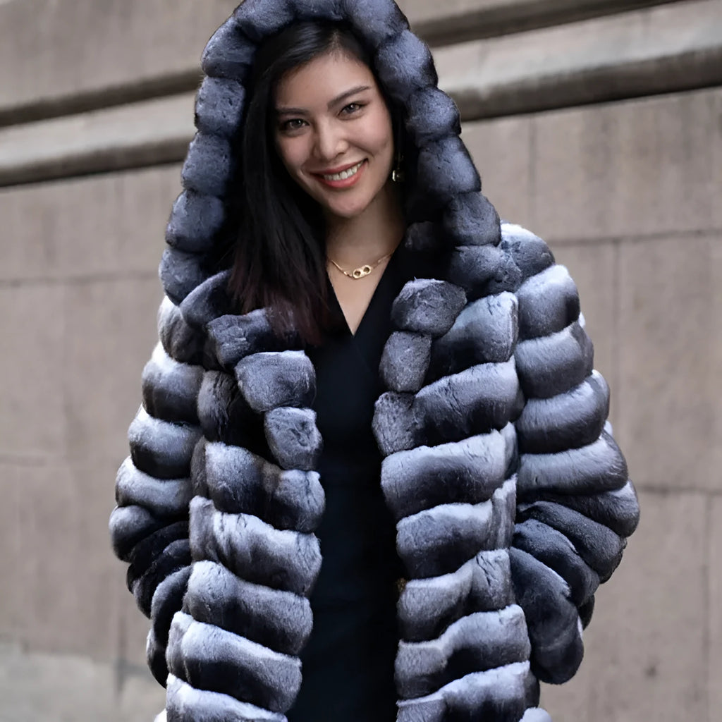 Women's zebra stripe faux fur overcoat with a 65cm medium length on a hanger