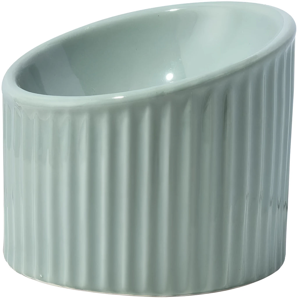 Elevated ceramic cat bowl in dark green colour showing tilted round design
