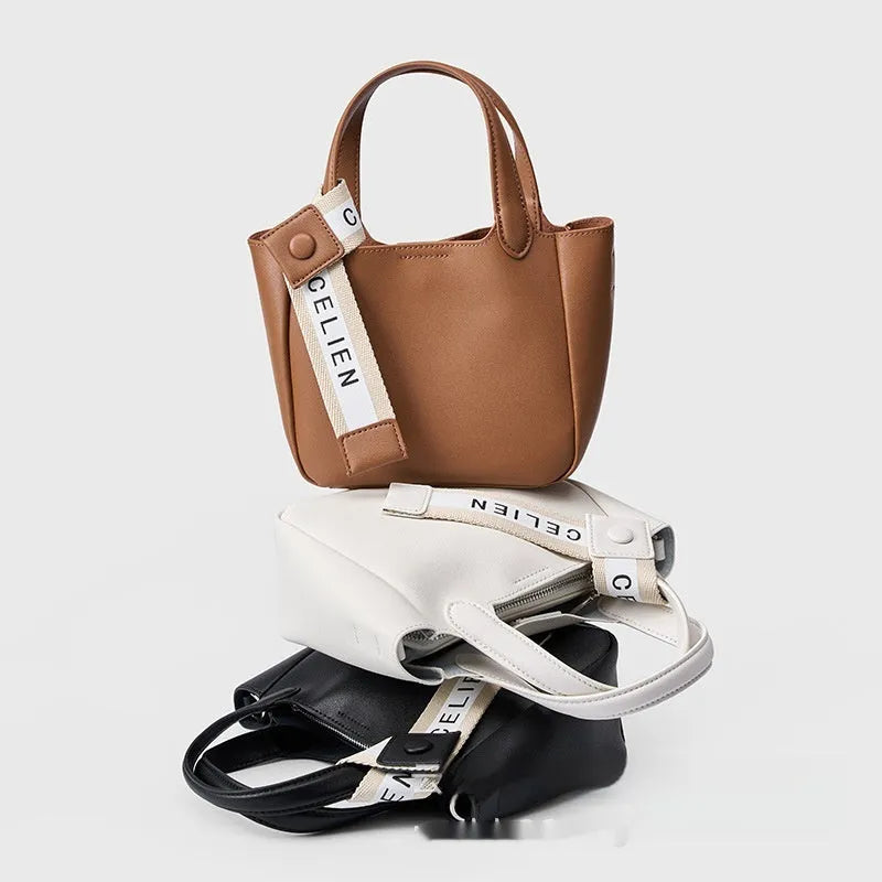 Genuine cattlehide leather cross body bucket bag in square vertical model with retro styling