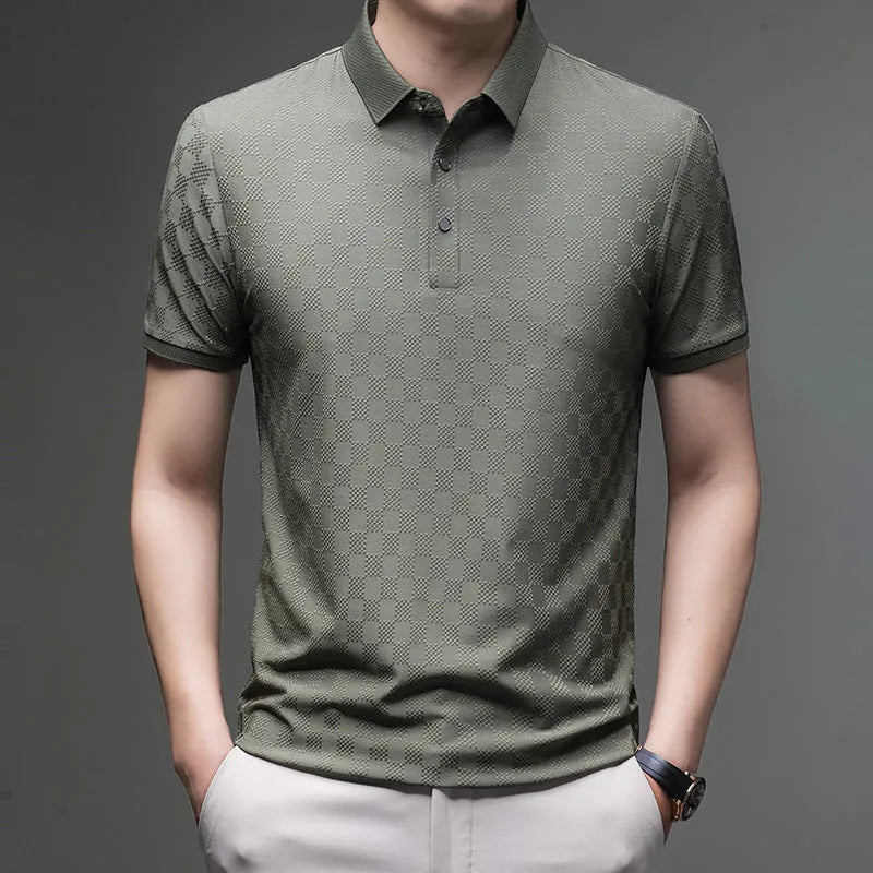 Man wearing a black rhombus-patterned short sleeve T-shirt with a slit detail.