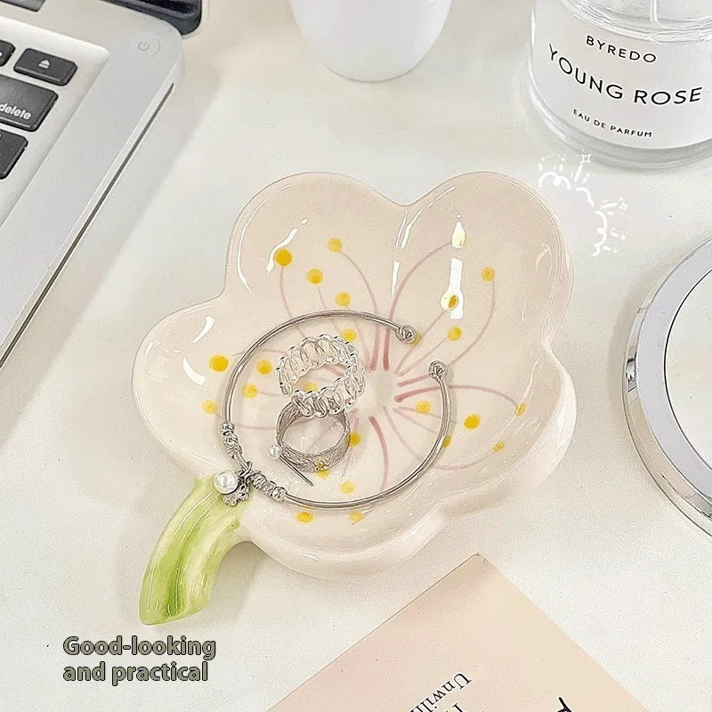 A white porcelain tray with a matching small night light, in pink or white, for a girl's bedroom.