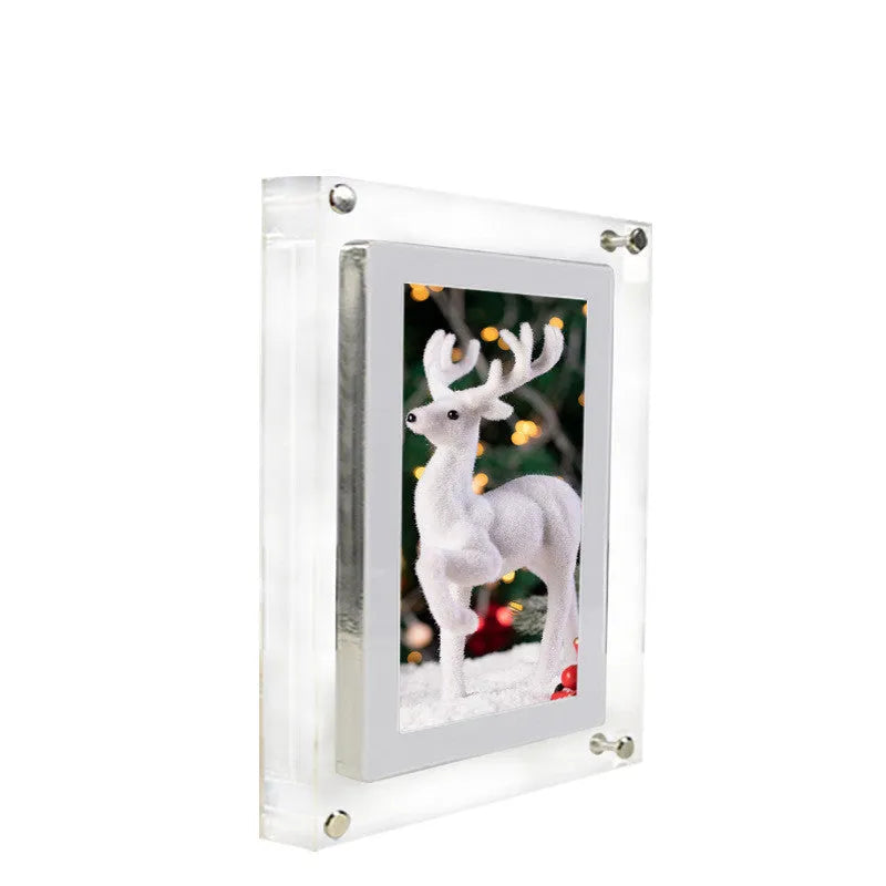 White acrylic digital picture frame with 5 inch vertical screen on a table