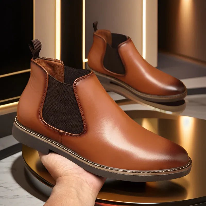 Men's black British-style chukka boot with a mid-calf height, flat square heel, and rubber sole.