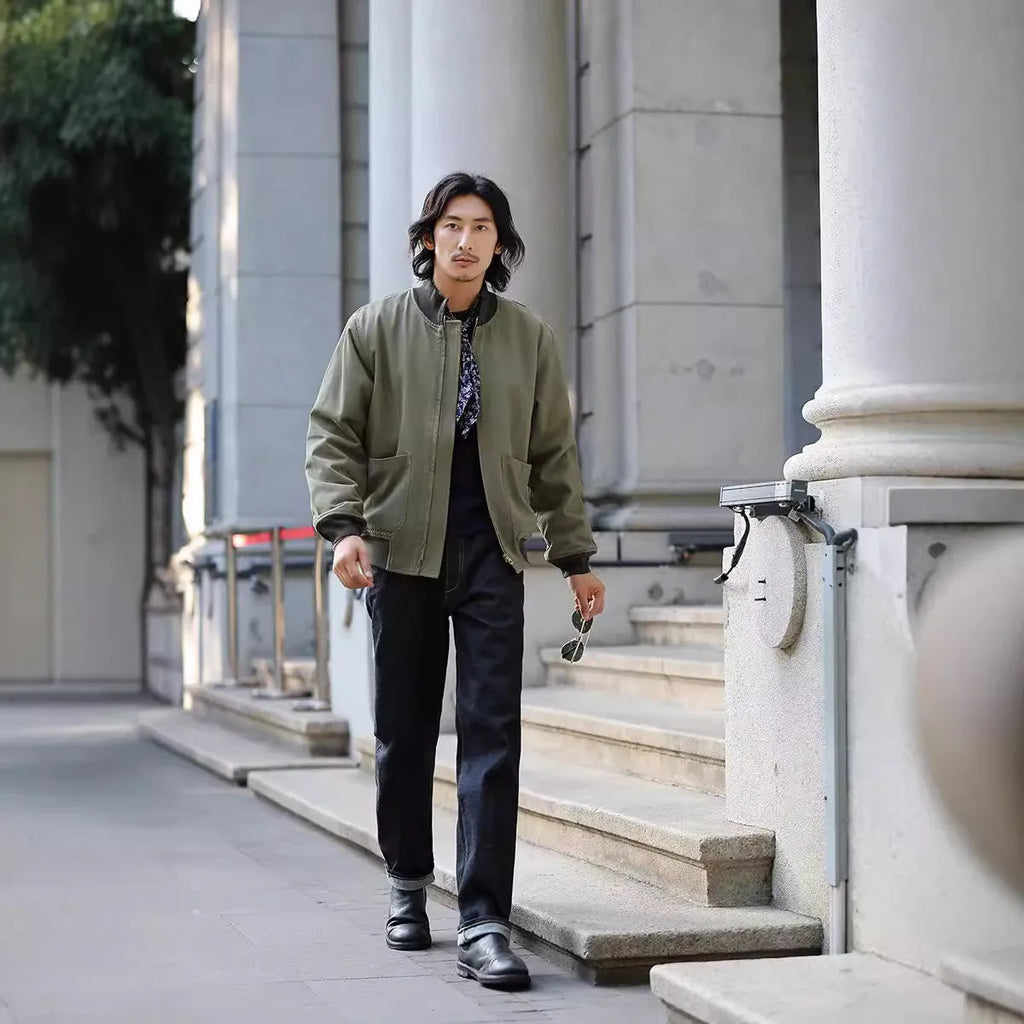 Men's cotton solid colour stand collar tank jacket in dark blue with long sleeves and round hem