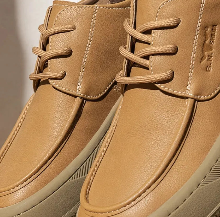 Brown leather retro casual shoes for men with a distinctive big toe design and visible stitching.