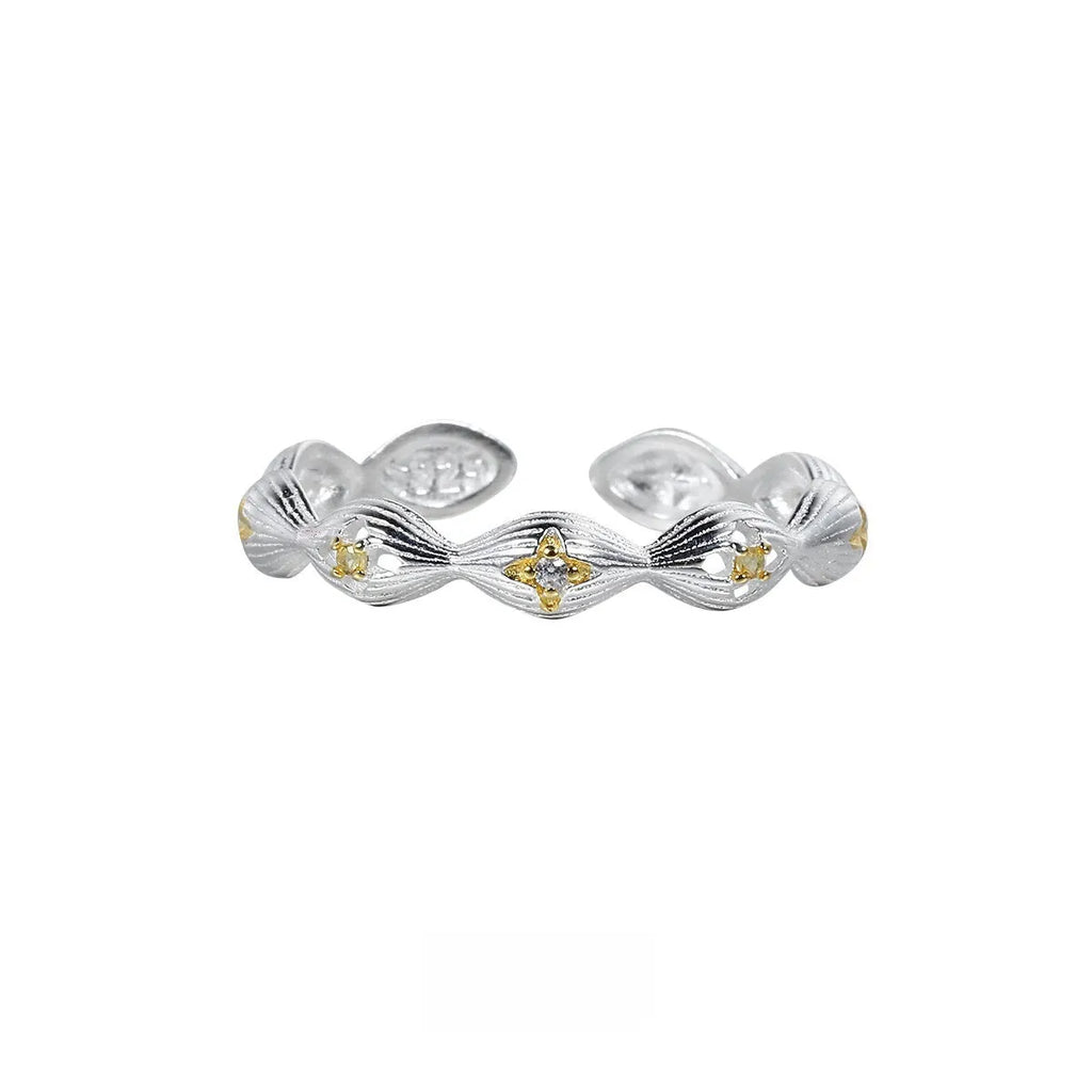 Buccherati brushed star ring in silver gold electroplated finish with adjustable opening on a white background