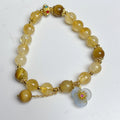 Yellow citrine crystal bracelet with flower tassel decoration for women