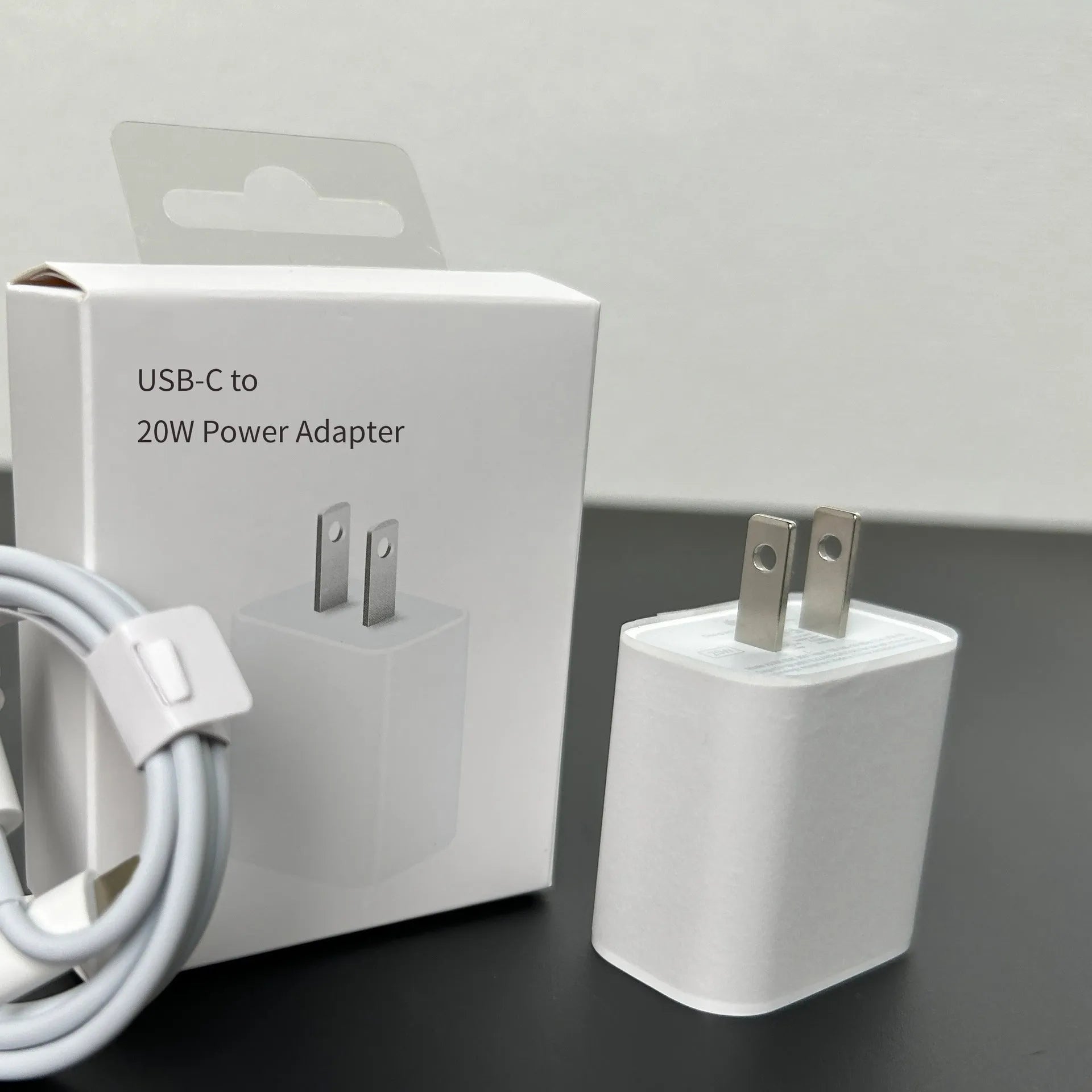 White 20W USB Type-C PD wall charger with set of five international travel plug adaptors
