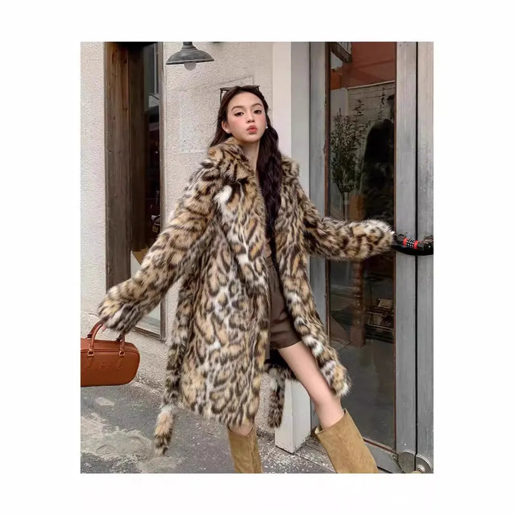 A woman's long faux fur coat with a fur collar and pockets, shown in a street fashion style.