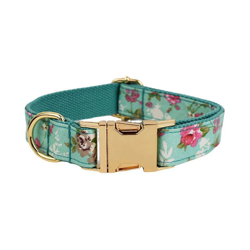 Rose pattern dog collar set on green background with detachable bow and matching leash