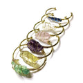 Natural crystal rough stone bracelet with gold winding geometric design showing colour mixing finish