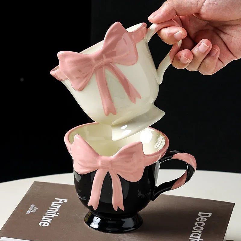 Original heart bow design ceramic mug in black pink or white powder colour, 350ml capacity.