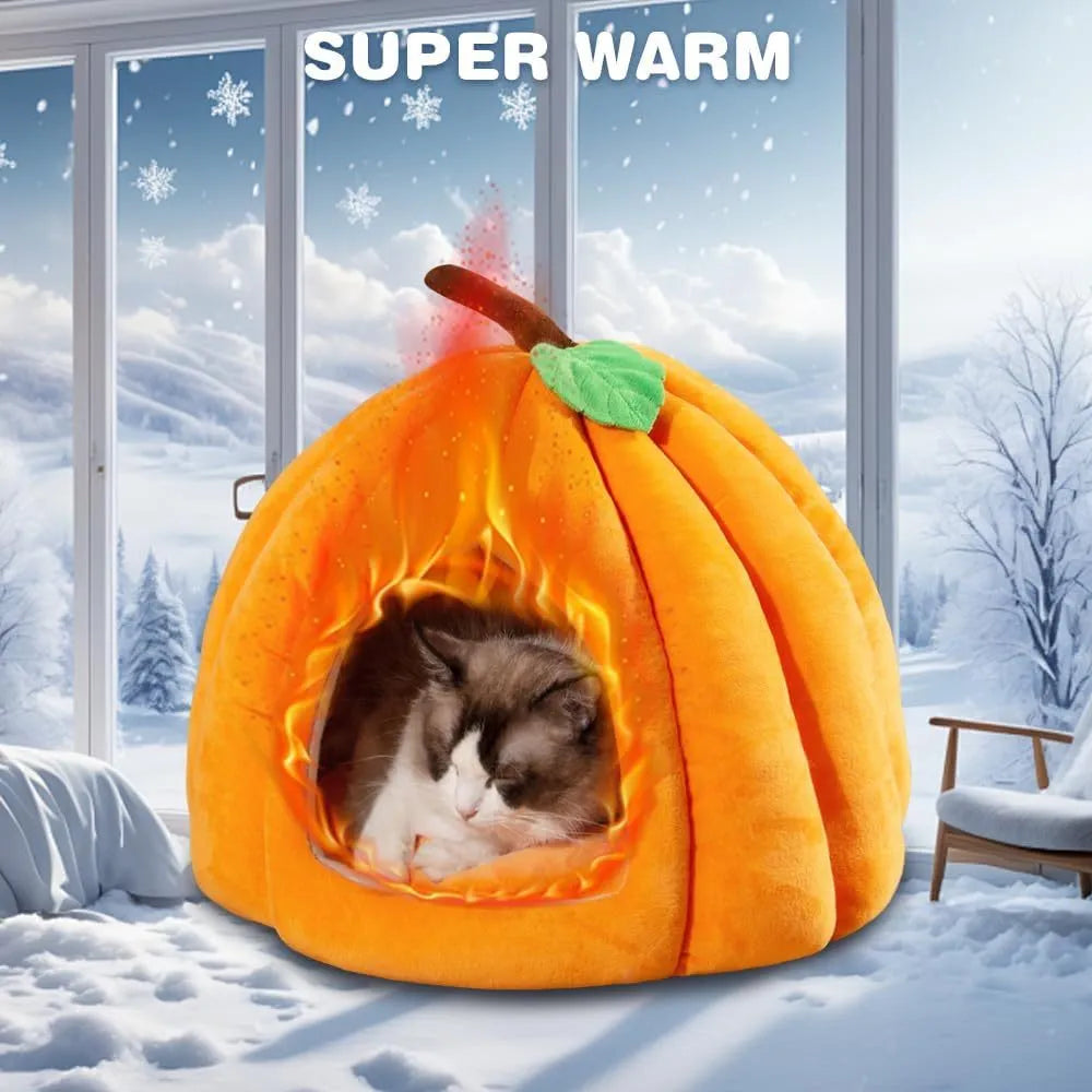 Grey pumpkin-shaped cat cave bed with plush fabric, shown with a small cat inside.