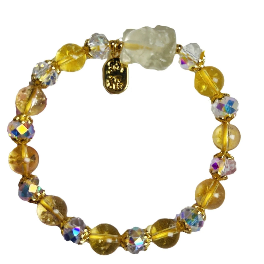 Handmade adjustable bracelet with a natural citrine nine-tail fox charm on a silver-tone chain.