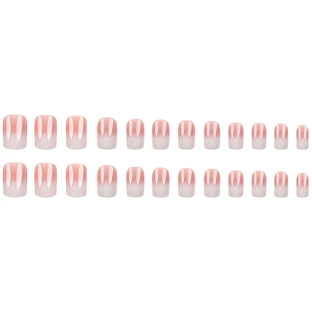 Pink and white gradient detachable nail stickers with starry sky pattern on hands showing medium European square shape