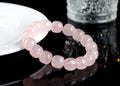Pink bamboo and crystal barrel bead bracelet with geometric design measuring 11mm to 12mm