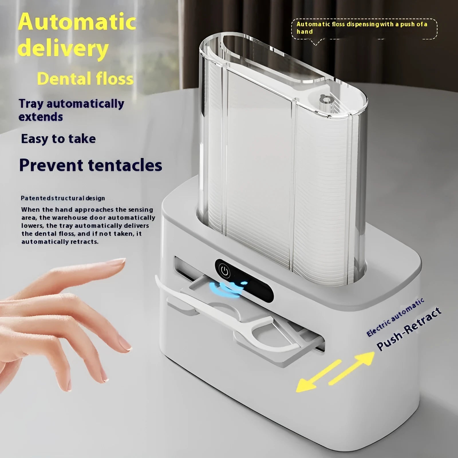 Dark gray automatic electric dental floss box with pop-up floss dispenser on a bathroom counter.