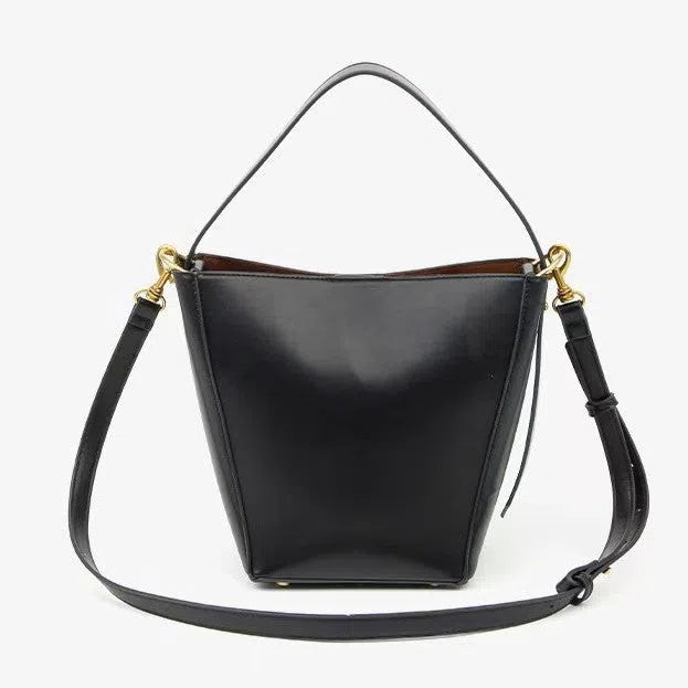 Urban minimalist bucket crossbody bag in army green with front three-dimensional pocket and adjustable strap