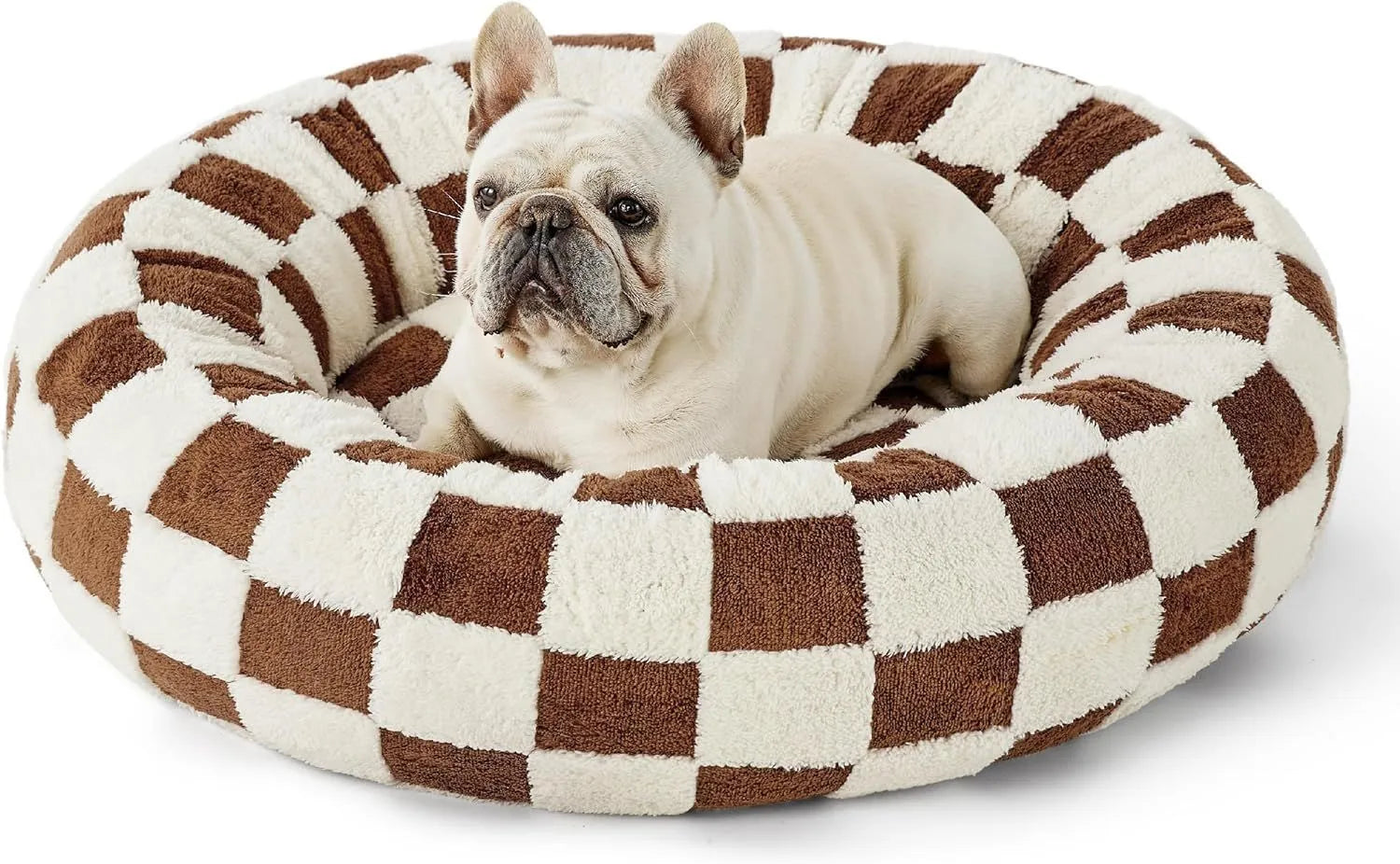 Round plaid dog bed with a plastic base shown in blue and white colours.