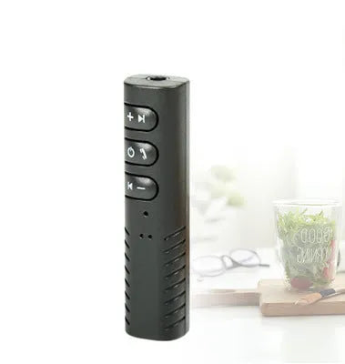 Bluetooth audio receiver with 3.5mm AUX plug in black, featuring V4.1 and 180mAh battery for wireless music and hands-free calls
