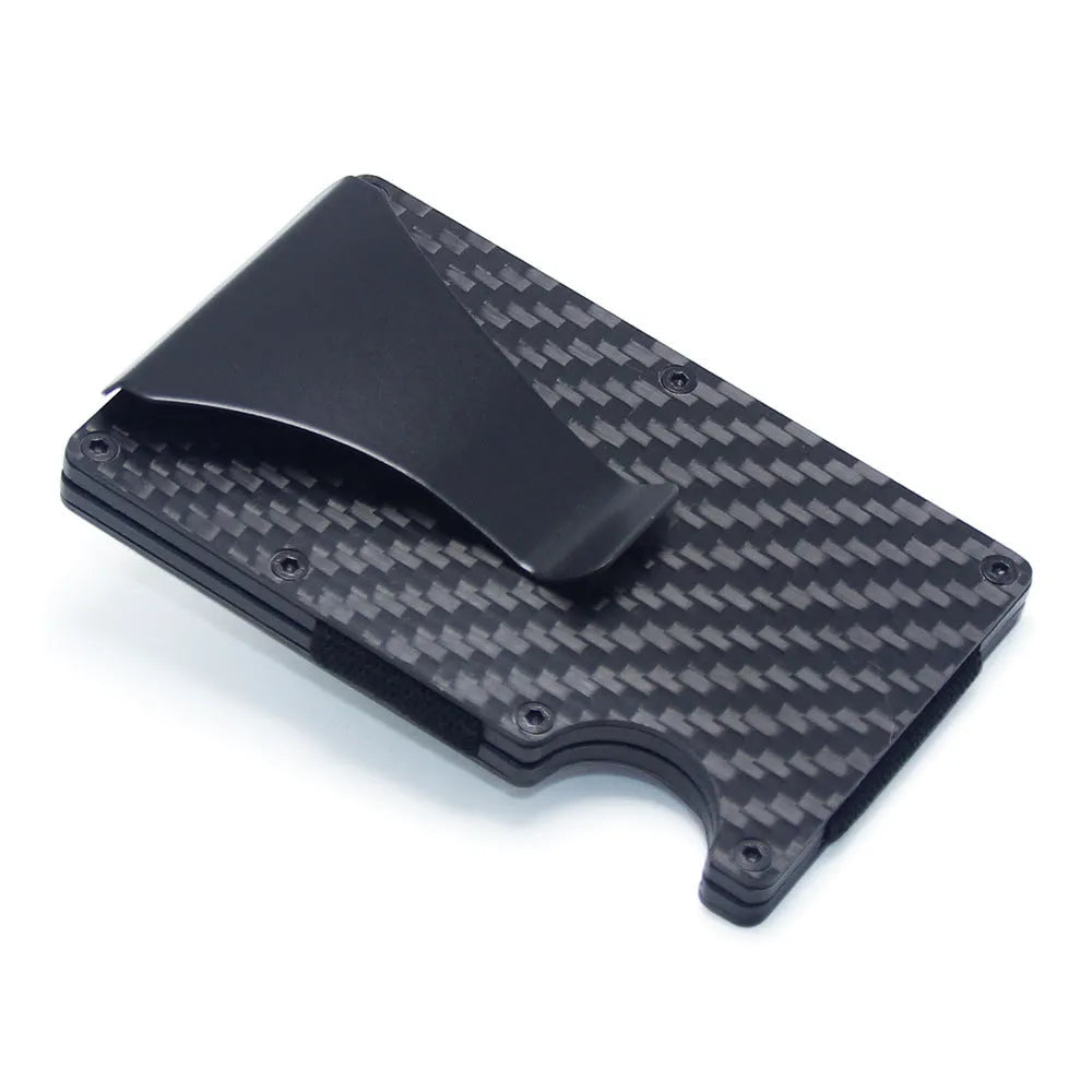 Slim black carbon fibre card holder wallet with geometric design on a gift box.