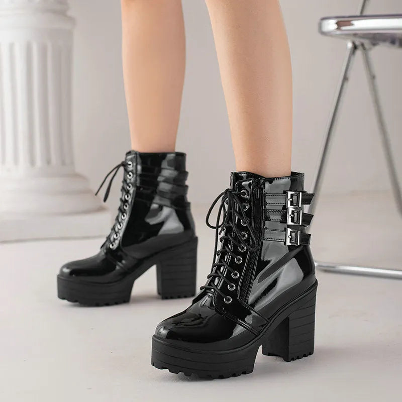 Women's black casual lace-up ankle boots with a chunky heel and thick rubber sole.