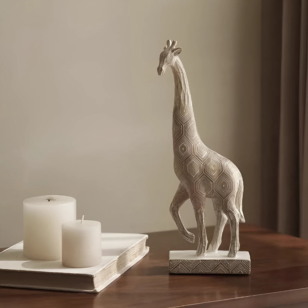 Tall wooden-coloured giraffe resin figurine ornament on a surface.