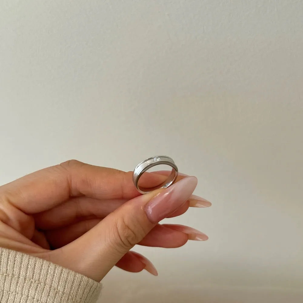 Women's silver ring with geometric hexagon and octagon arc design and zircon inlay in electroplated platinum finish