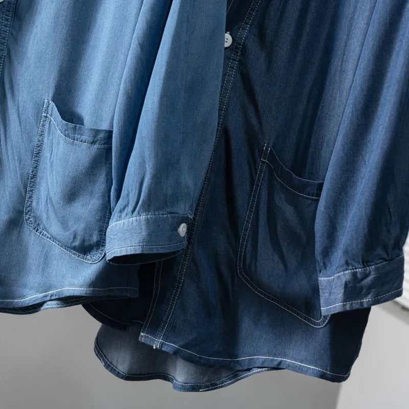 Men's dark blue three-quarter sleeve denim coat with V-neck collar and side pockets