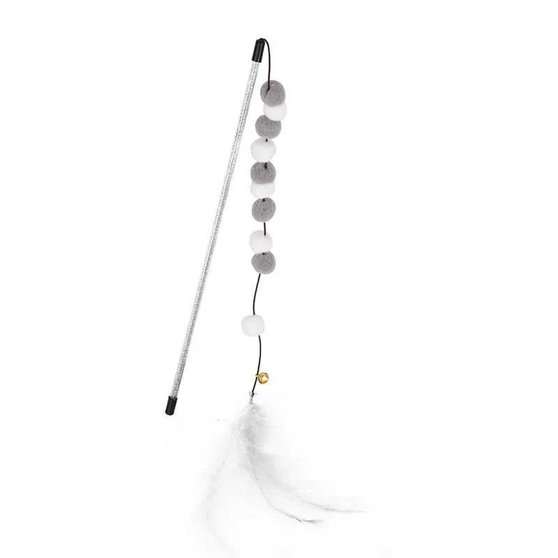 A blue acrylic cat teaser wand with pompon feathers and a bell, shown next to a grey and yellow version.