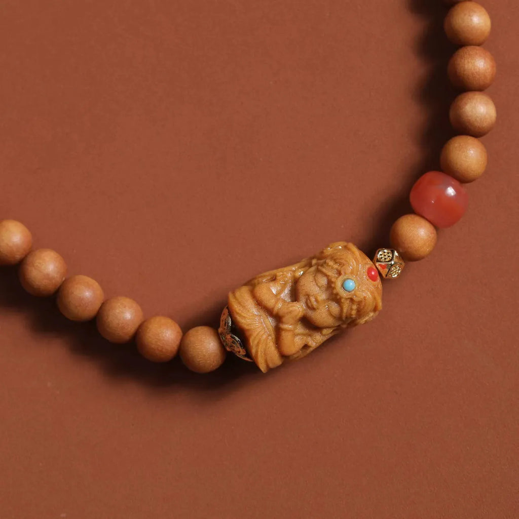 Brown sandalwood bracelet with South Red double circle design and 6mm round beads