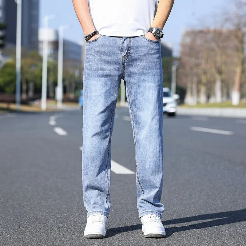 Tapered thin stretch denim trousers for business casual wear in light blue
