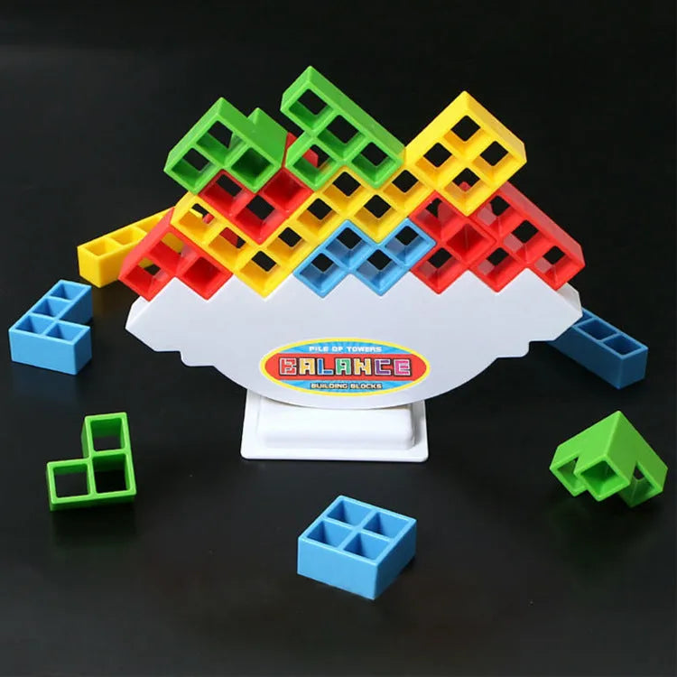 Plastic balance stacking board game with coloured building blocks on chassis for kids and adults