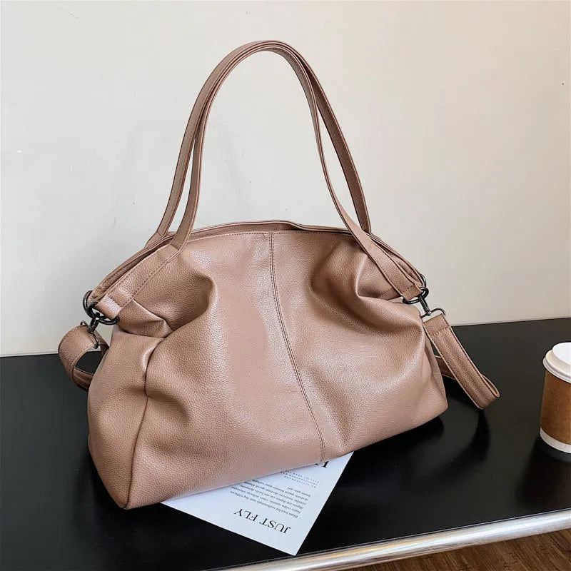 Large soft surface PU tote messenger bag in horizontal square shape with shoulder strap and zipper opening