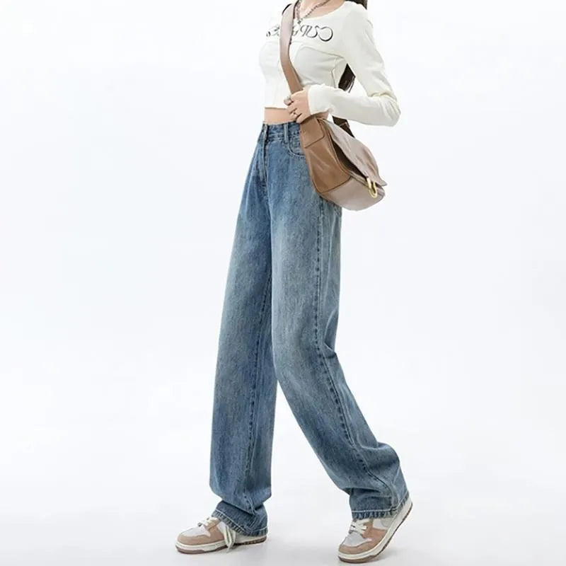 Women's retro blue high waist wide leg jeans on a hanger, showing straight cut and front button detail.