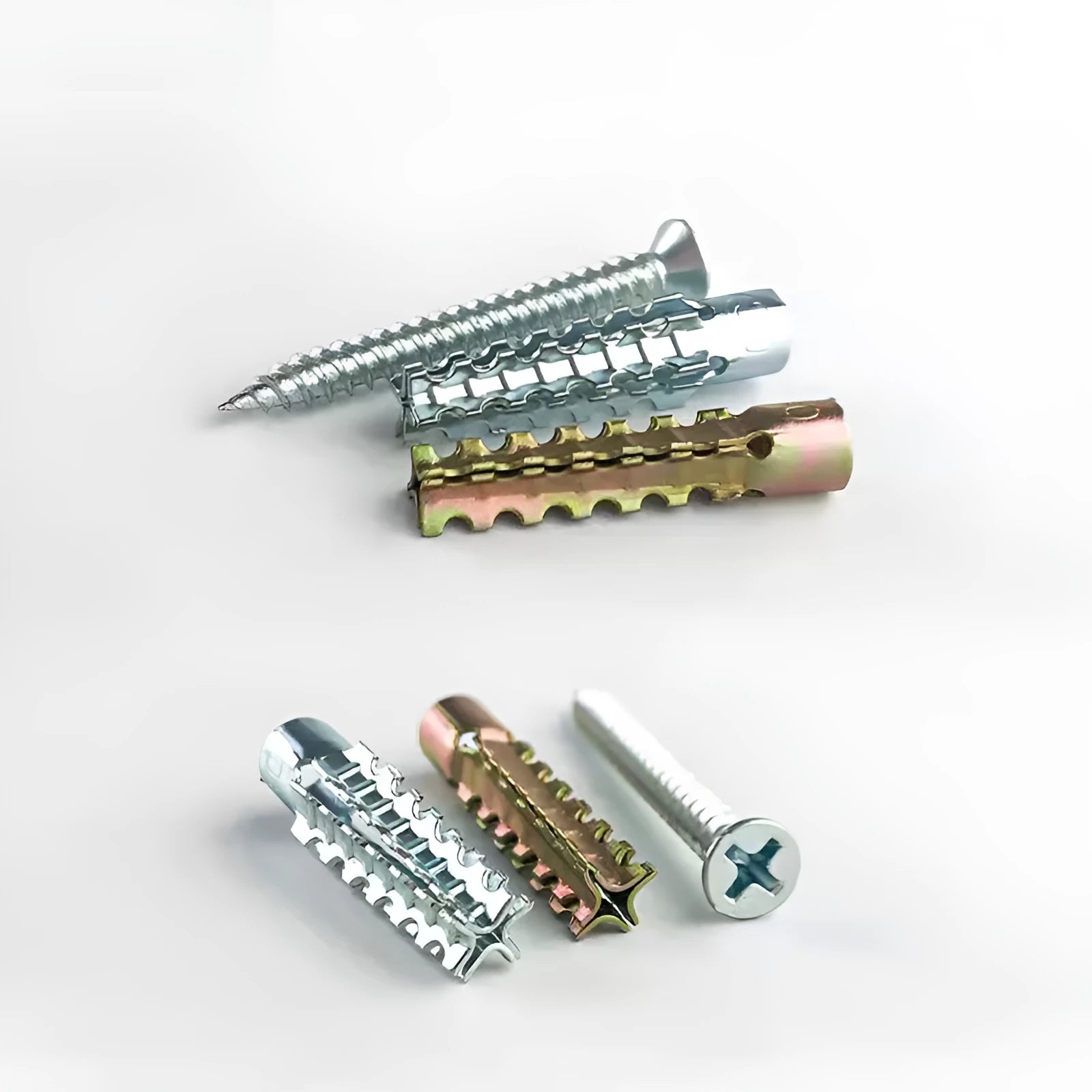 Close-up of metal expansion screw showing barbed serrations and iron construction.