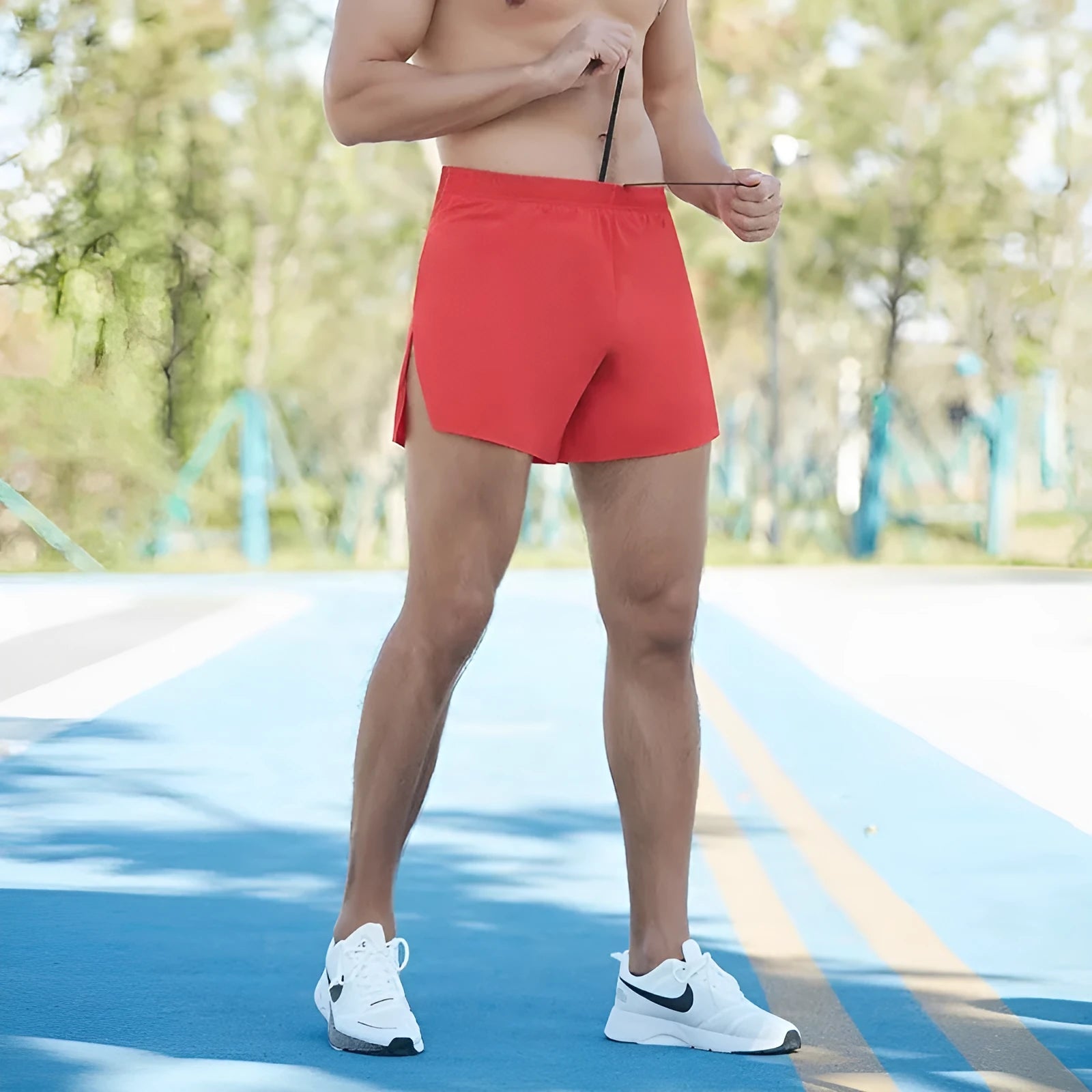 Men's black high-waist loose-fit off-road running shorts for marathon and cross-country.