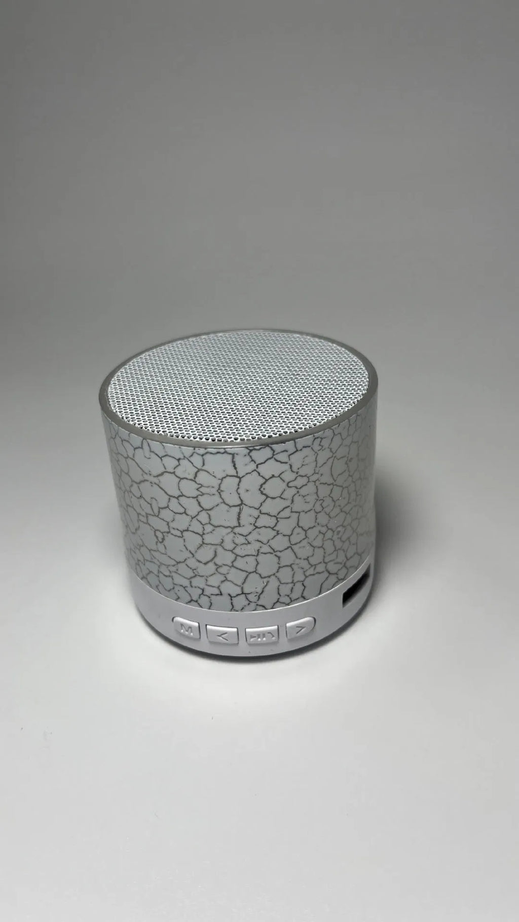 A9 Mini Cracked Bluetooth speaker in white with cracked-effect finish and LED lights