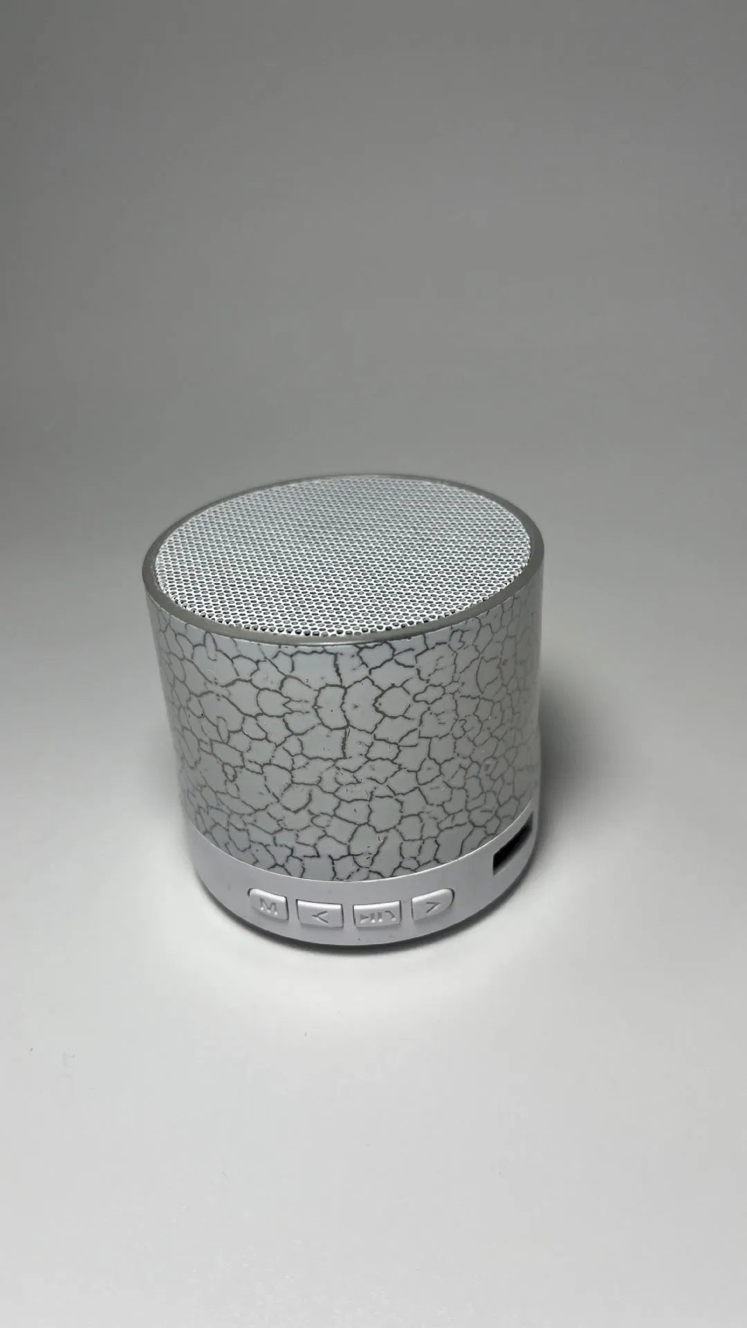 A9 Mini Cracked Bluetooth speaker in white with cracked-effect finish and LED lights